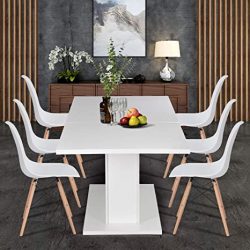 Mesa de comedor blanca con sillas